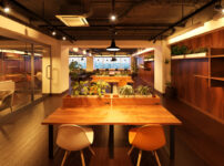 デジタルノマドがノートPCで仕事をするイメージとバーチャルオフィスの概念図